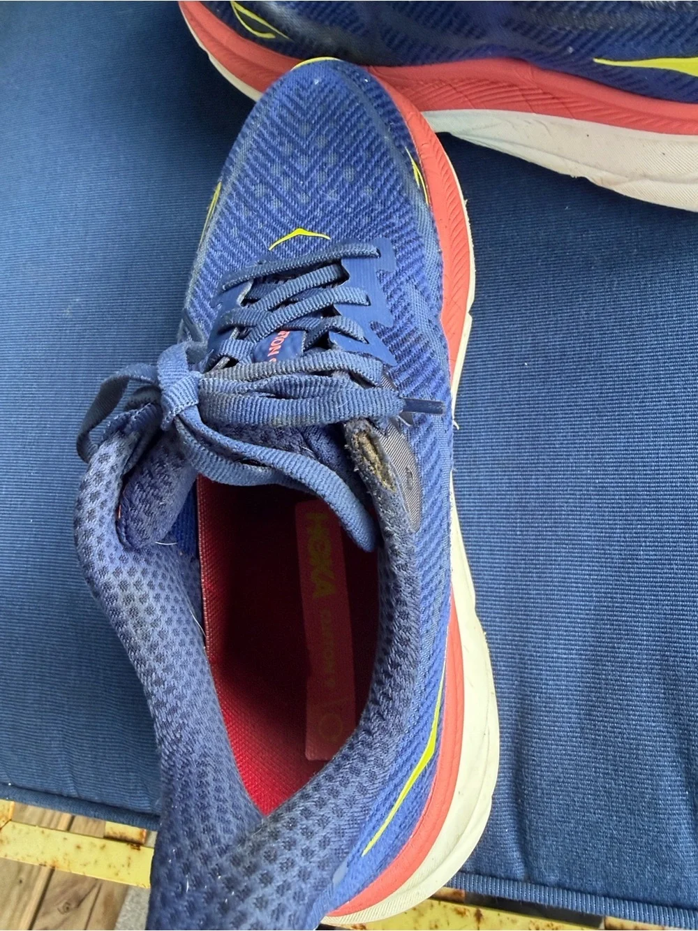 Hoka Women's Blue Running Shoes with Coral and Yellow Accents